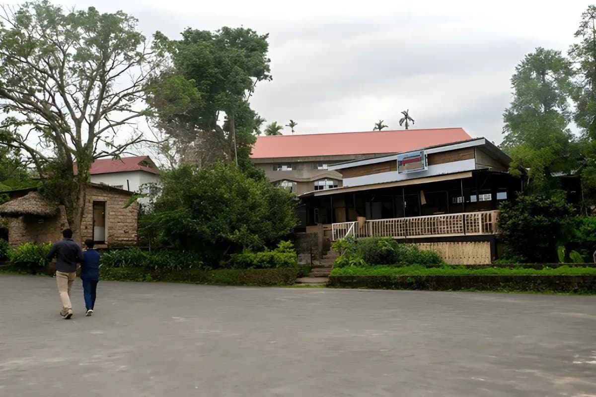 People walking in Mawlynnong Village