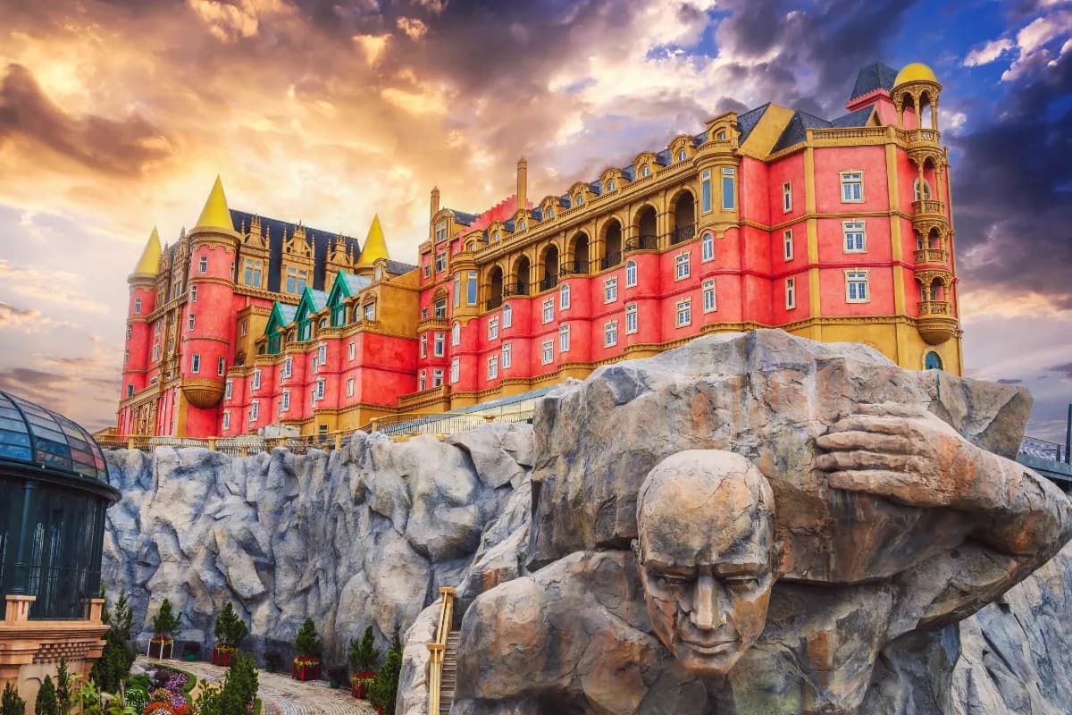 Fantastic fabulous stone castle on a mountain at sunset in Ba Na Hills Park