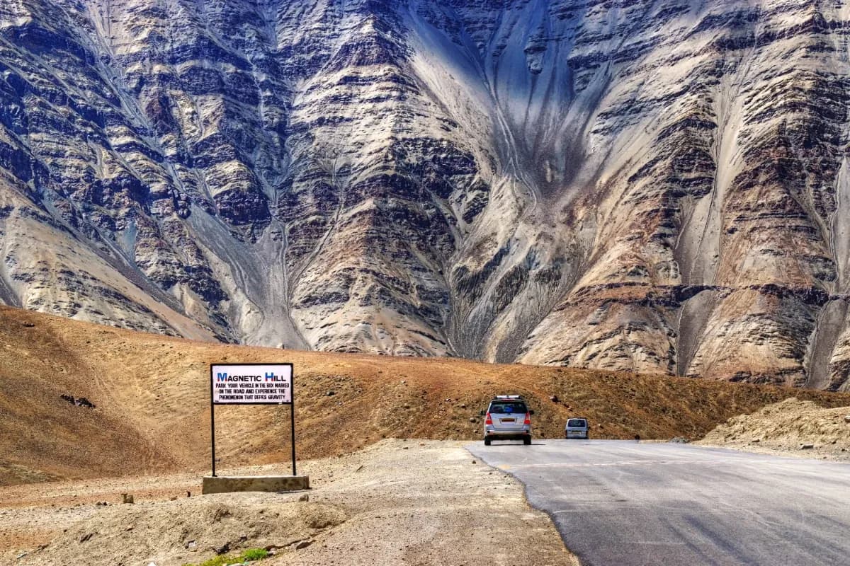 Car moving forwards to Magnetic Hill of Ladakh