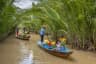 A girl selling flower on boat at Thoi Son Island