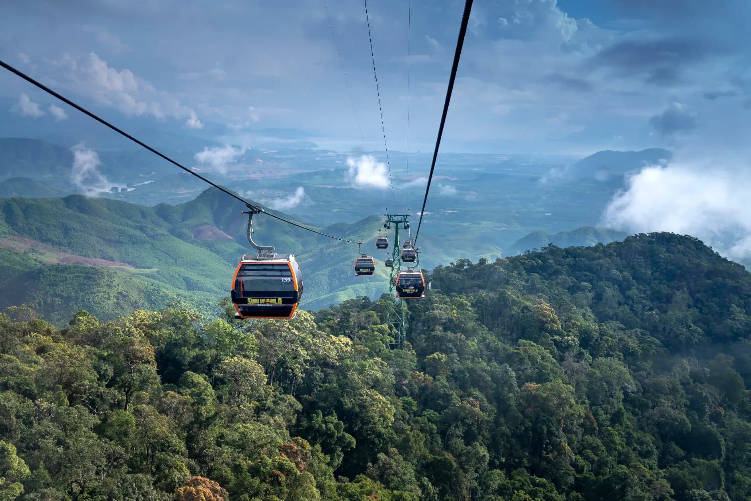 Tourists come to visit Ba Na Hills by cable car