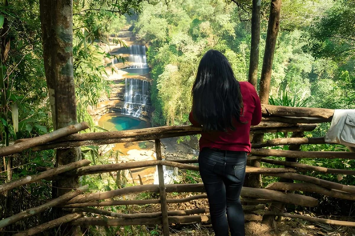 young girl watching wei sawdong waterfall