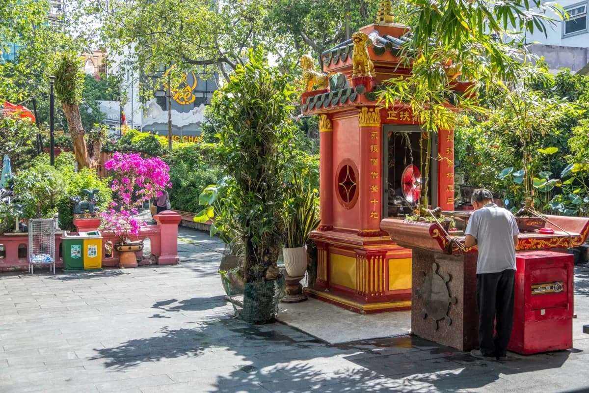 Man praying at the Jade Emperor Pagoda in Saigon