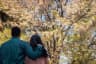 young couple watching cherry blossom flowers