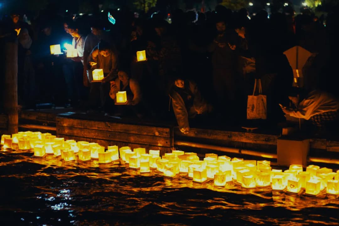 Glowing Lanterns on the River