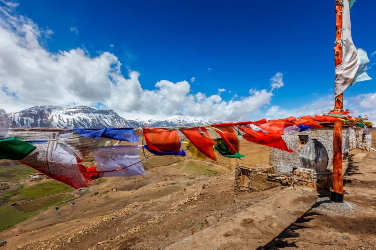 Buddhist prayer flages lungta in Buddhist Monastery in Comic Village