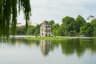 Hoan Kiem lake in Hanoi Vietnam with willow branches on foreground