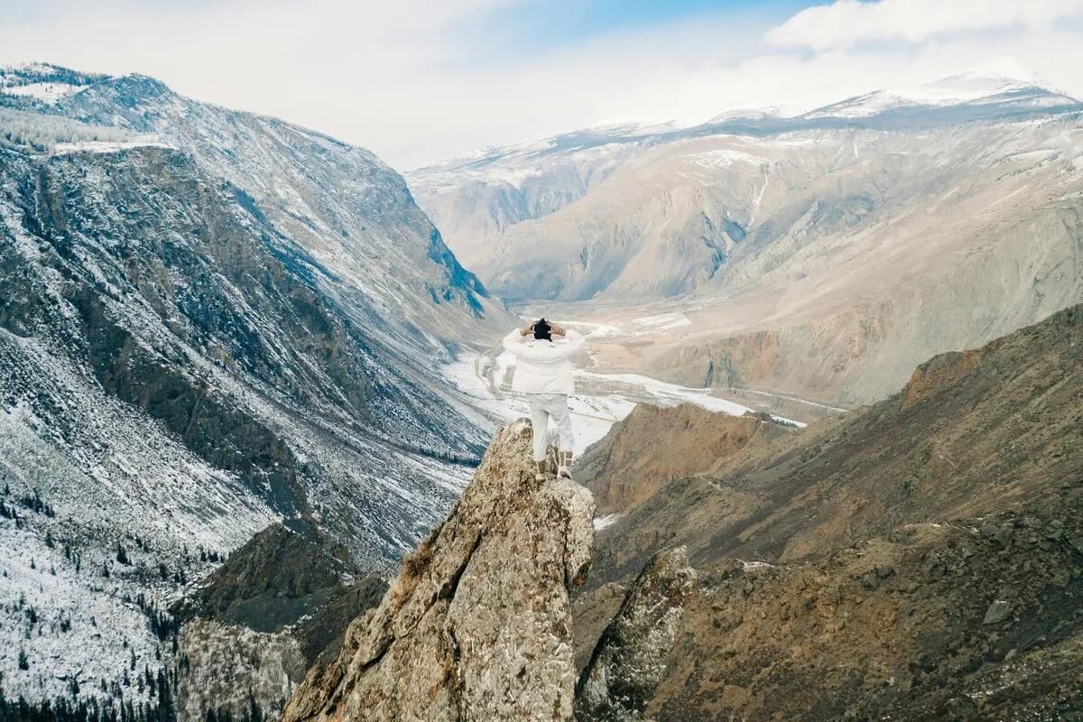 A Woman Standing on the Rock