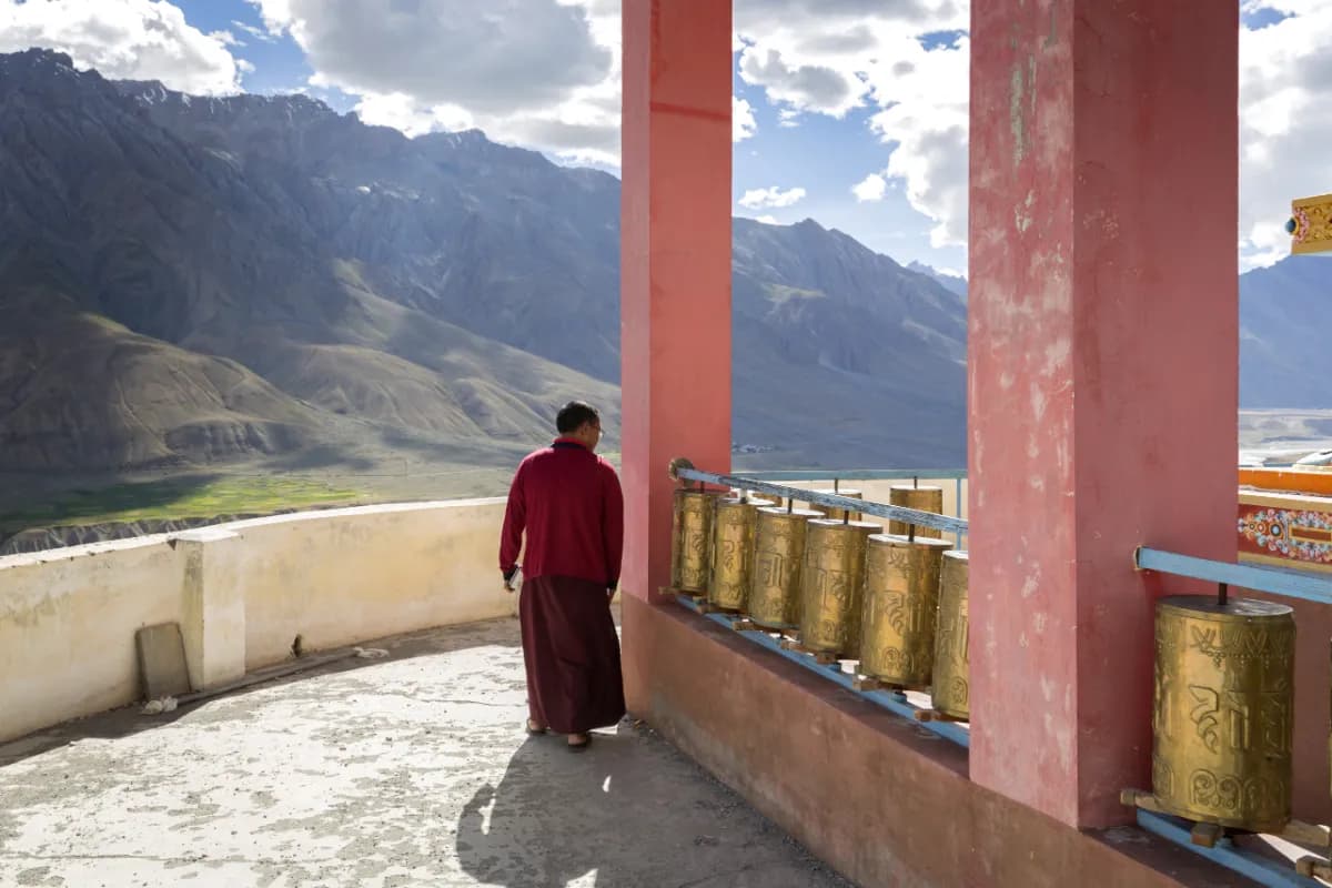 Monk walking through Key Monastery