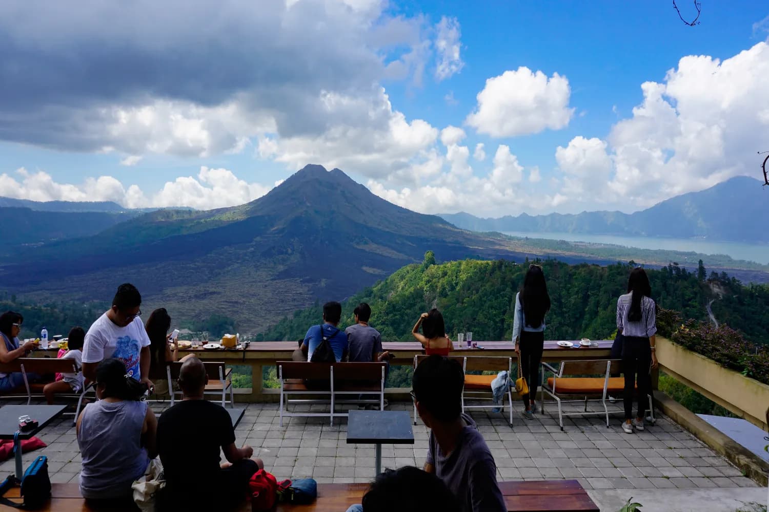 Tourist enjoying the view of volcano mount located in Kintamani