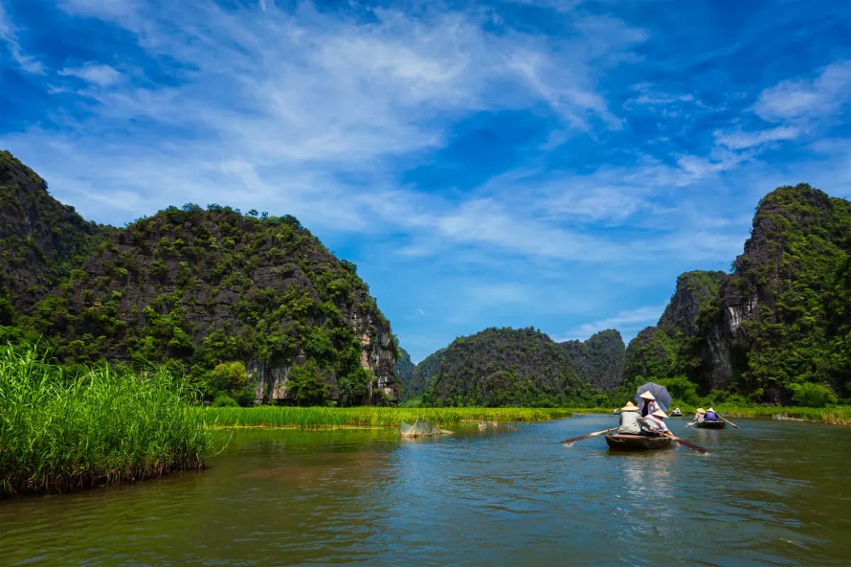 Tourists on boats in Tam Coc-Bich Dong