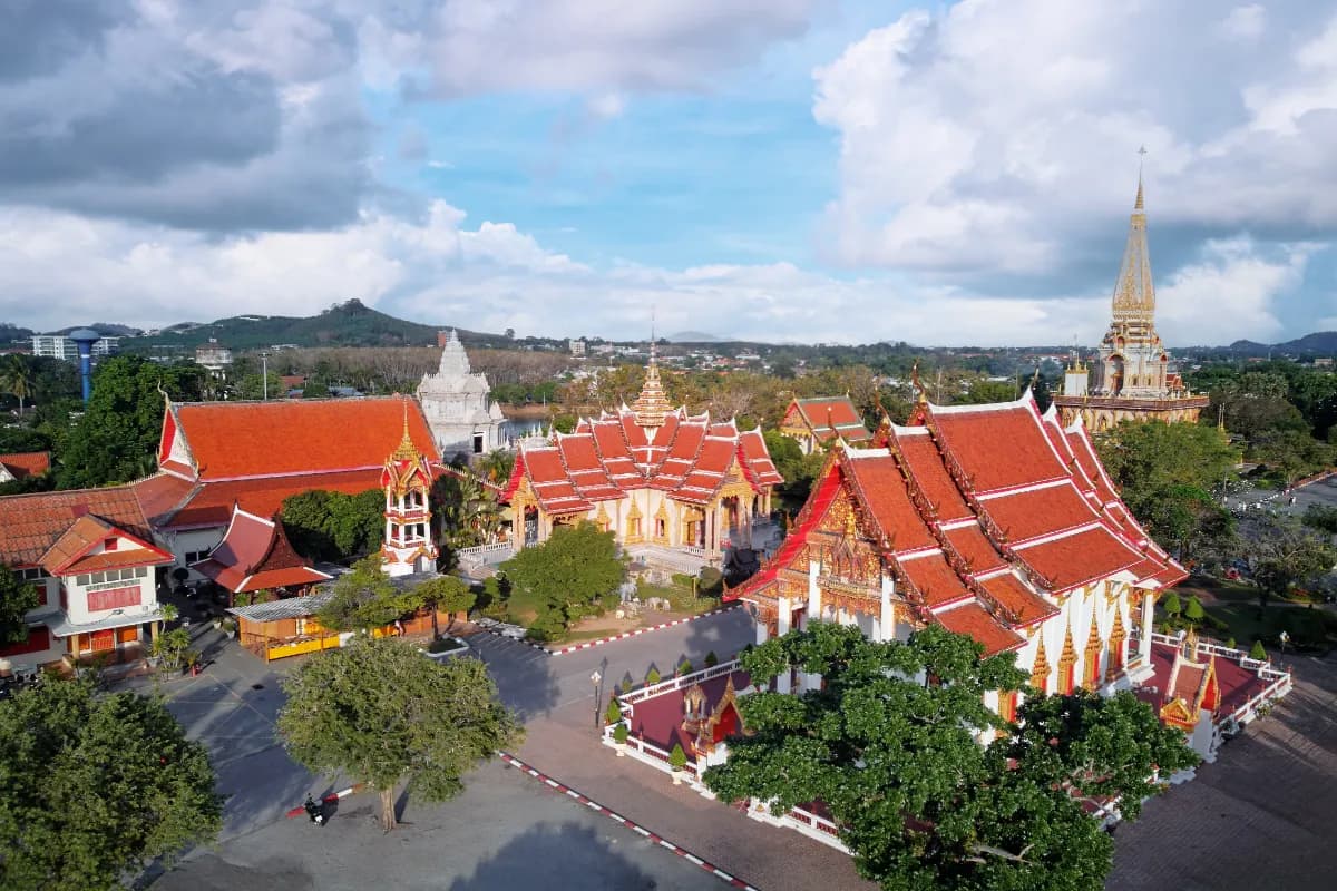 Drone shot of The Wat Chalong Buddhist temple in Chalong, Phuket, Thailand