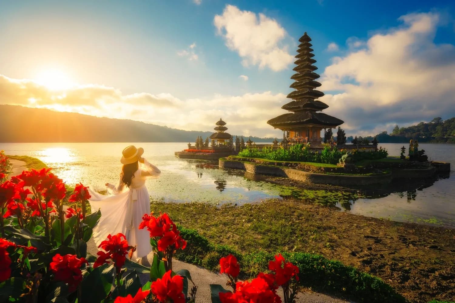 A female tourist admiring the breathtaking scenery of Ulun Danu Beratan Temple