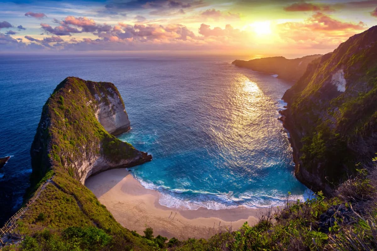 Kelingking Beach at sunset in Nusa Penida island in Bali