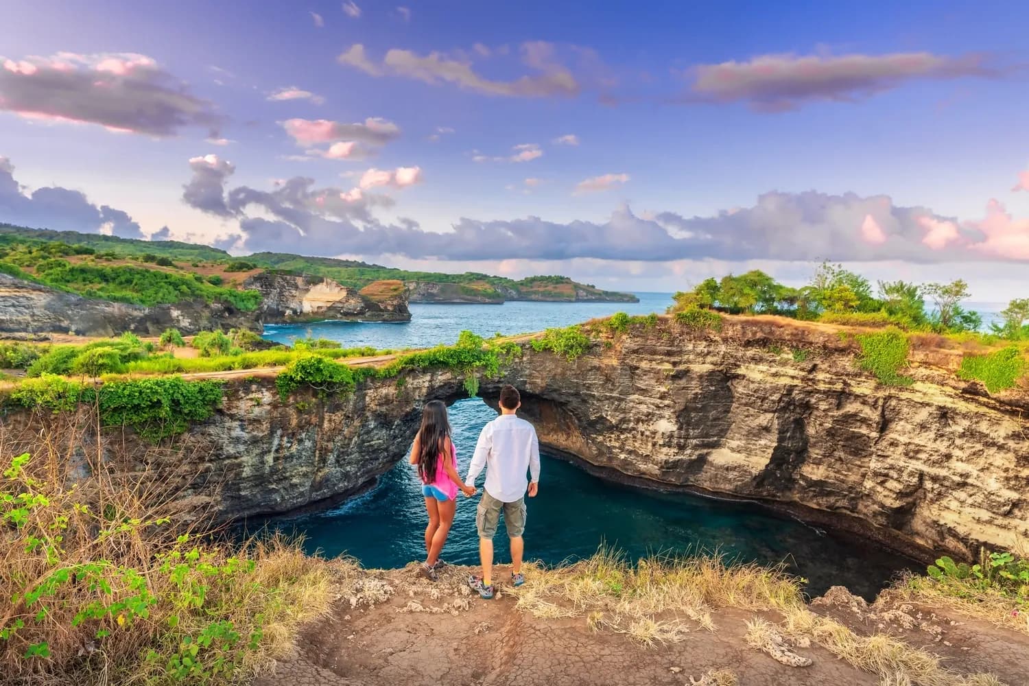 Tourists enjoying beach Broken Beach in Nusa Penida