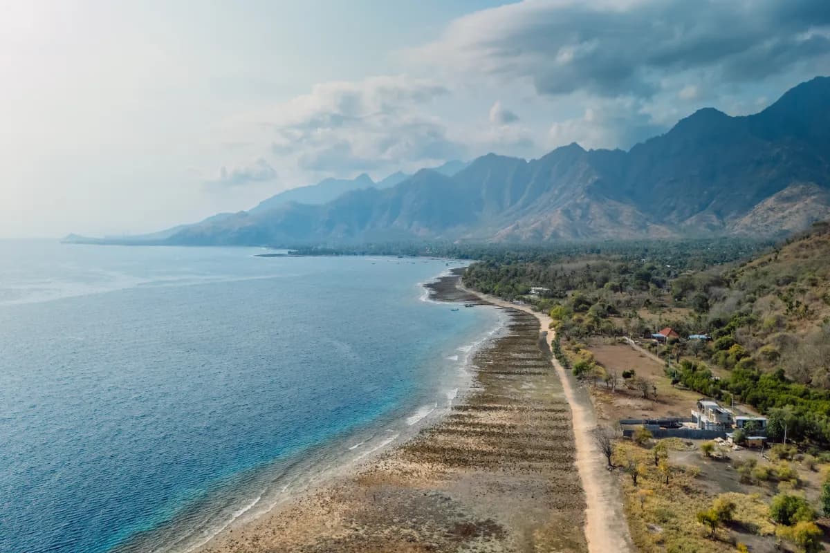 Scenic landscape with ocean and mountains in Pemuteran in Bali