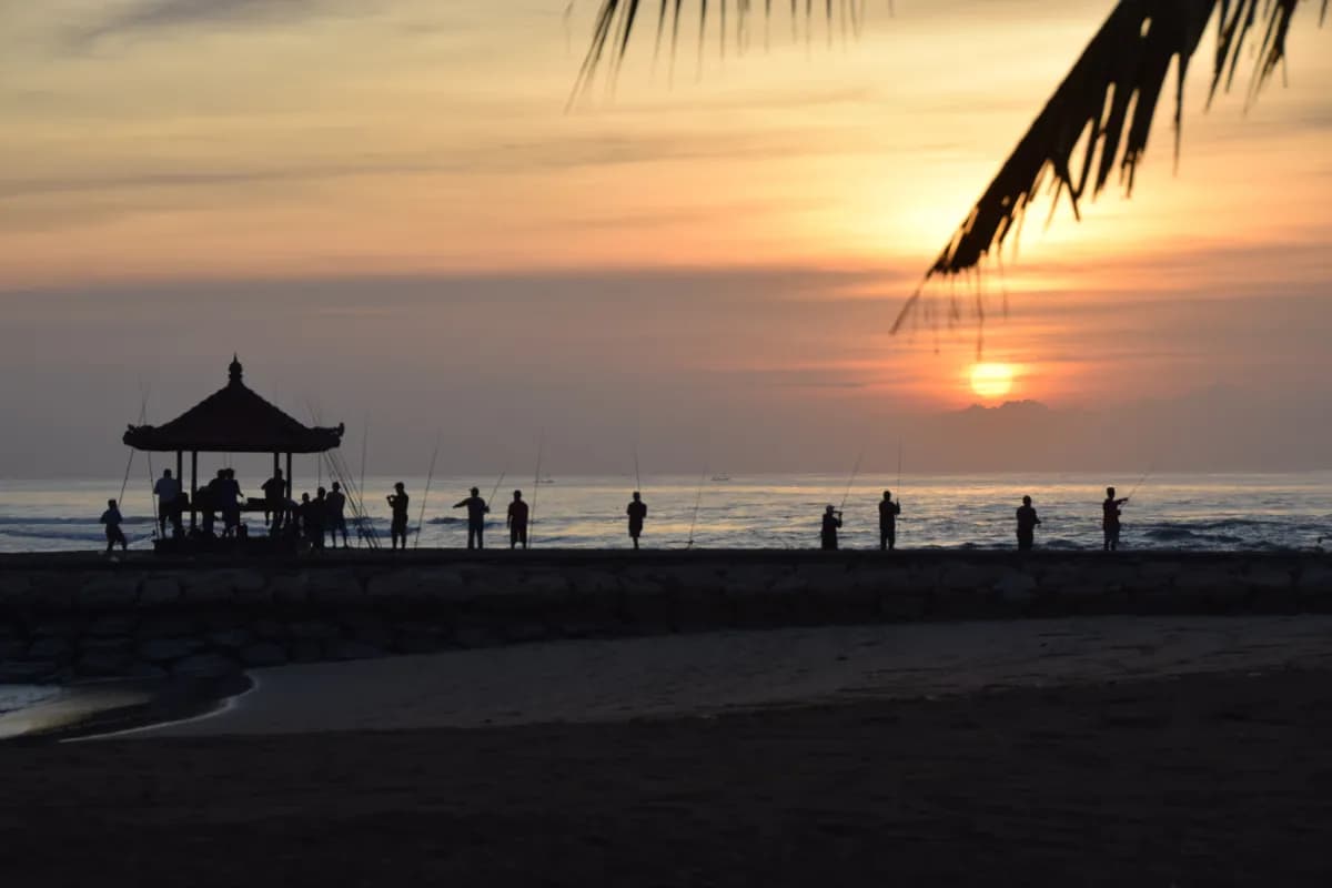 People Enjoying Sunset at Nusa Dua In Bali