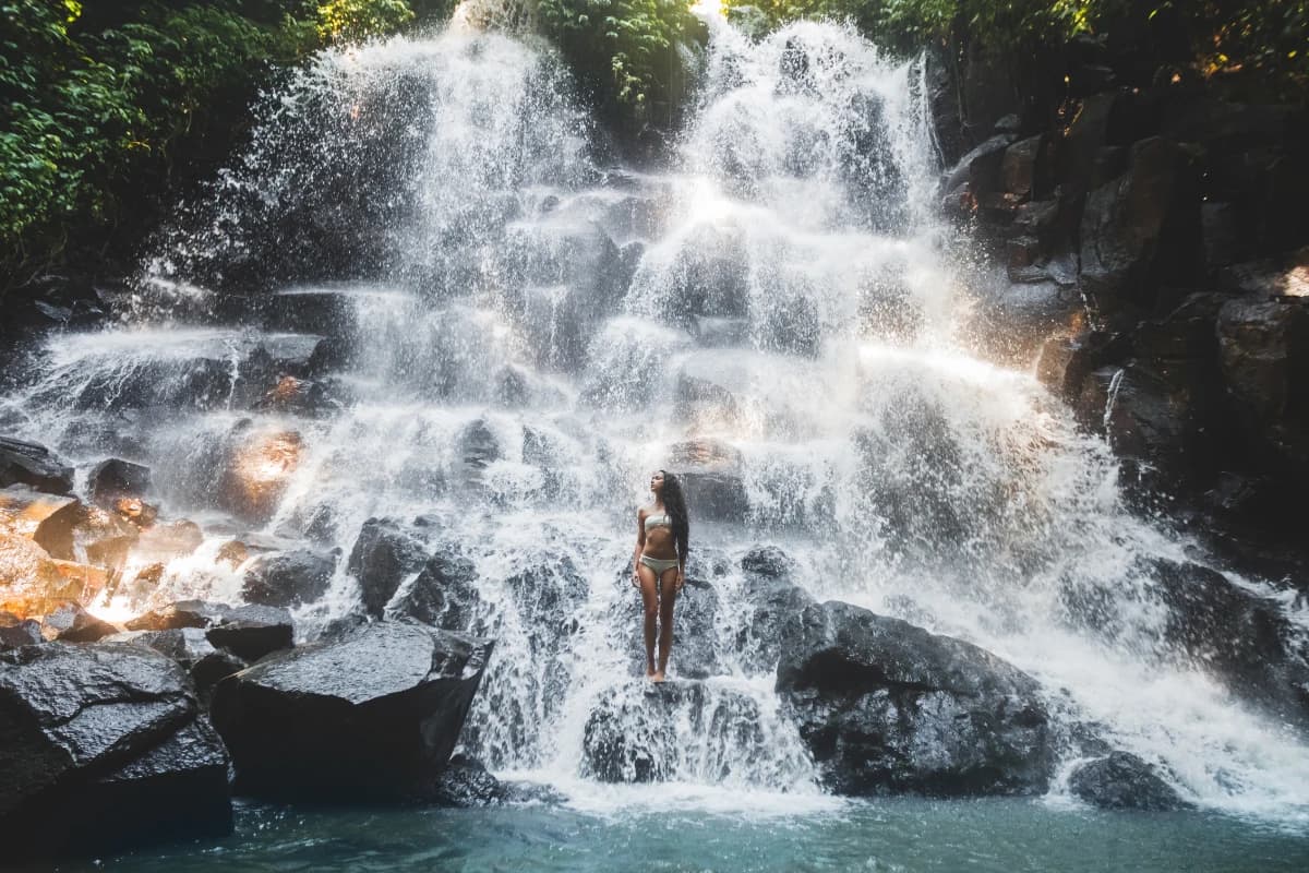 Woman Stading on Kanto Lampo Waterfall